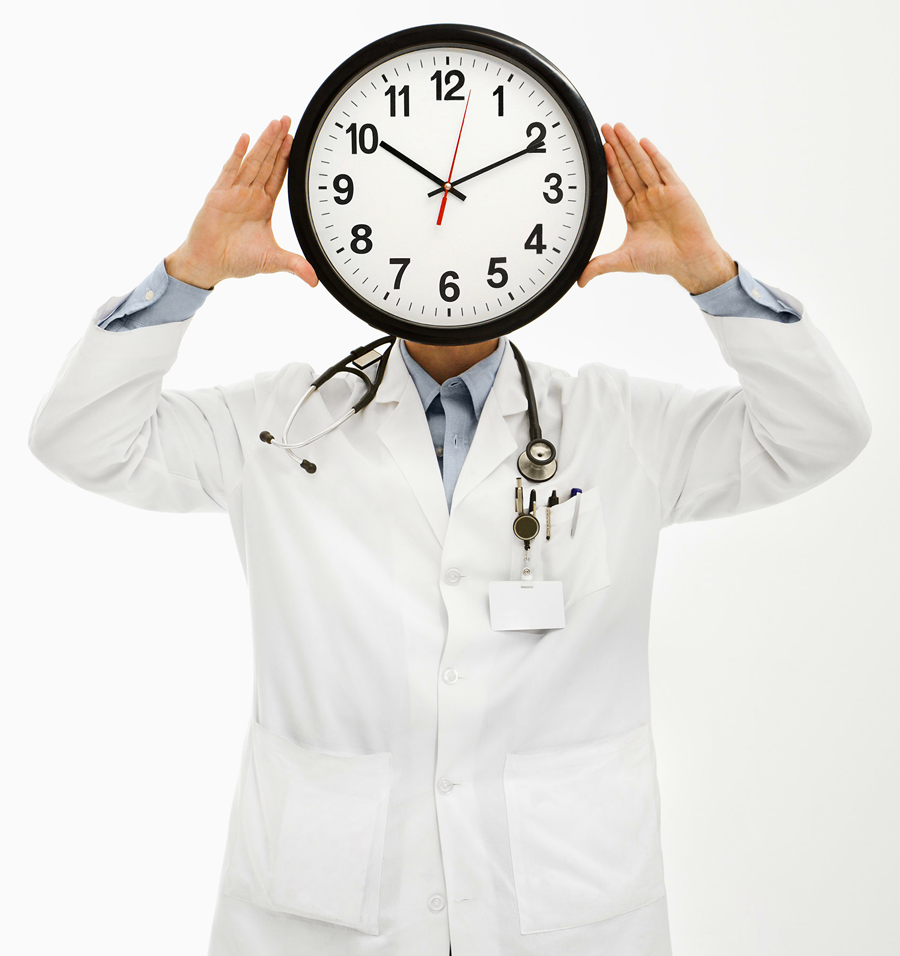 Doctor holding a clock