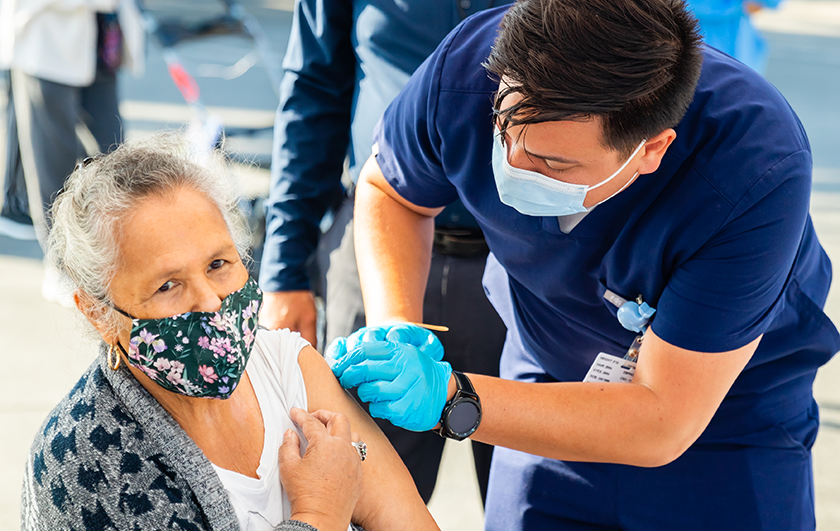 woman getting a vaccine