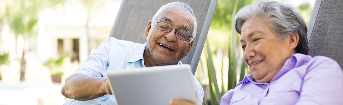 couple looking at tablet