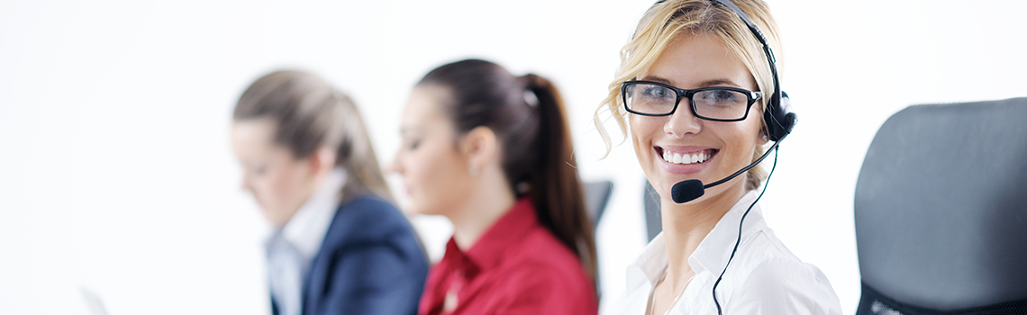 Business woman group with headsets