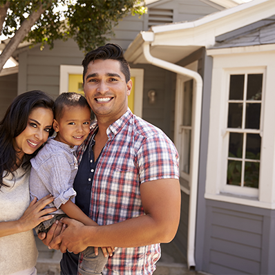 family outside their house