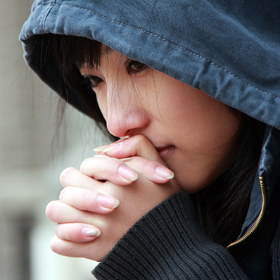 a young woman in a hoodie