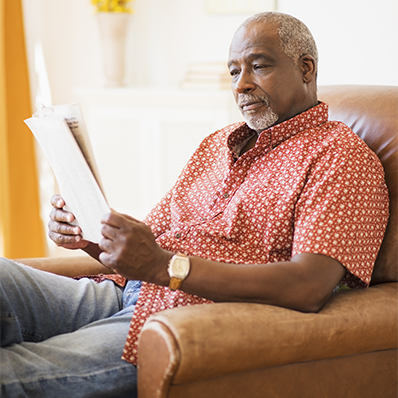 a man sitting and reading