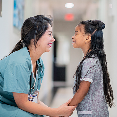 Doctor Talking to a Little Girl Doctor Talking to a Little Girl