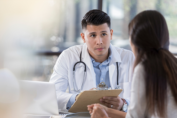 doctor talking to patient