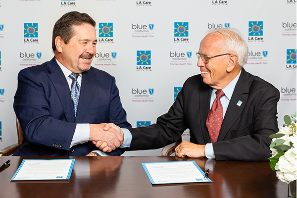 L.A. Care CEO John Baackes and Blue Shield of California Promise Health Plan CEO Dr. Greg Buchert 