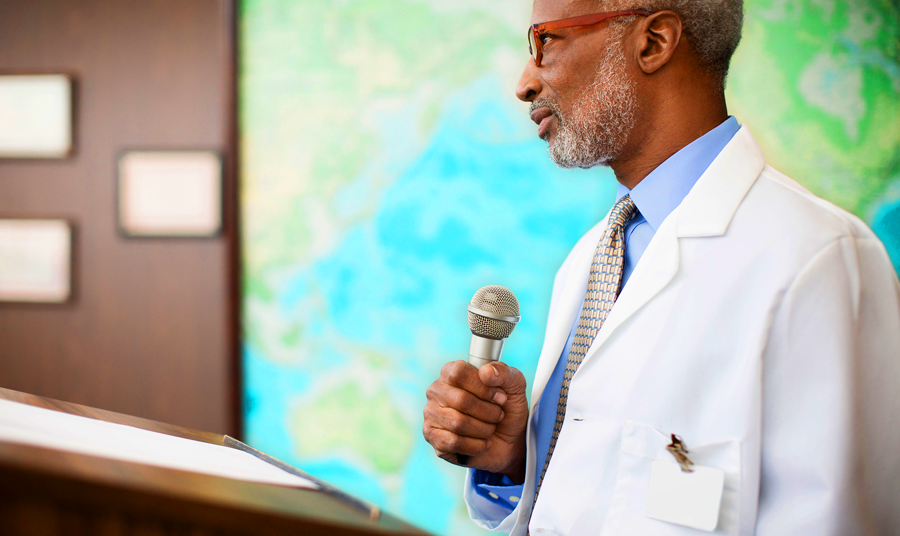 Doctor holding a microphone