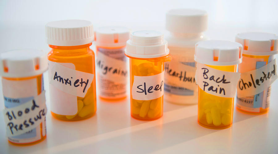 image of prescription pill bottles with hand-written labels