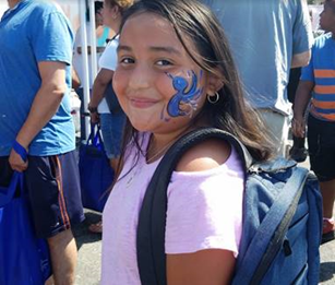 a girl at a back to school fair