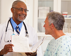 a patient having a conversation with his doctor