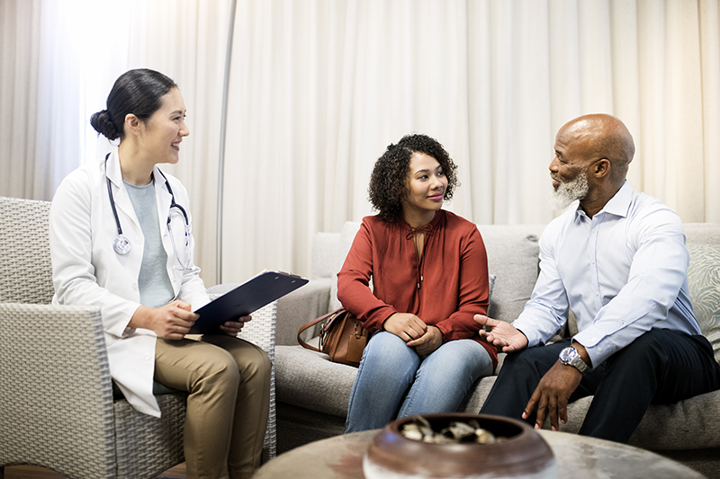 Doctor talking to patients