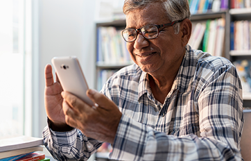 senior on a phone