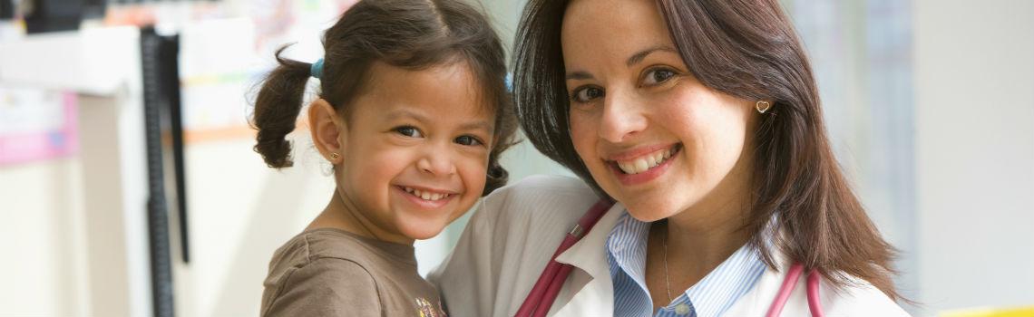 Doctor and child smiling