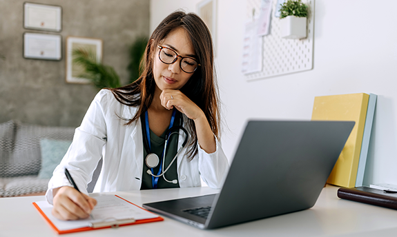 doctor at laptop